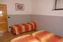 Stanza con 3 posti letto