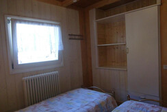 Detail of bedroom with two single bed