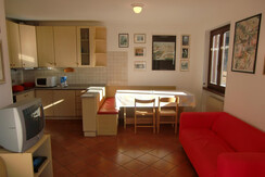 Ampio soggiorno con zona cottura