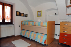 Stanza con letto estraibile