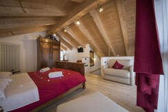 Suite con letto matrimoniale e poltrona letto